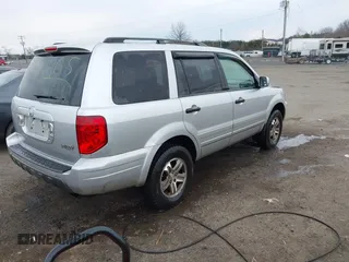 2005 Honda Pilot EX with VIN 5FNYF18455B064378, listed as a IAAI auction lot 41684465 with 248,225 mi miles and . Bid and sale history available at DreamBid. Image 4.