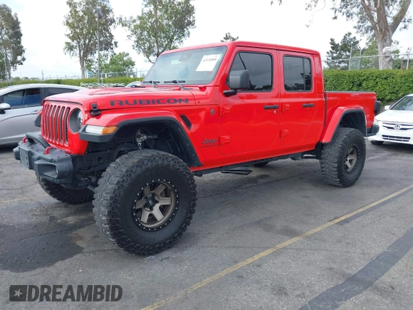 2021 Jeep Gladiator Rubicon with VIN 1C6JJTBGXML572976, listed as a IAAI auction lot 42134909 with 35,612 mi miles and . Bid and sale history available at DreamBid. Image 17.