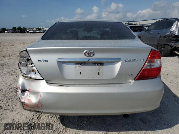 2002 Toyota Camry XLE z VIN 4T1BF32K22U532171, wystawiony jako Copart lot #54527965 z przebiegiem 165 637 mil mil oraz Szkoda całkowita • Salvage title. Historia ofert i sprzedaży dostępna na DreamBid. Obrazek 6.