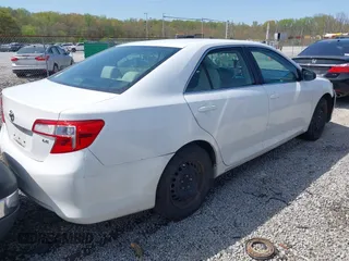 2014 Toyota Camry L with VIN 4T1BF1FK9EU864286, listed as a IAAI auction lot 41921249 with 154,122 mi miles. Bid and sale history available at carsss.com. Image 4.