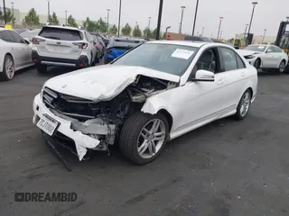 2014 Mercedes-Benz C 250 Sport with VIN WDDGF4HB7EA908236, listed as a IAAI auction lot 42379526 with 133,796 mi miles and . Bid and sale history available at DreamBid. Image 2.