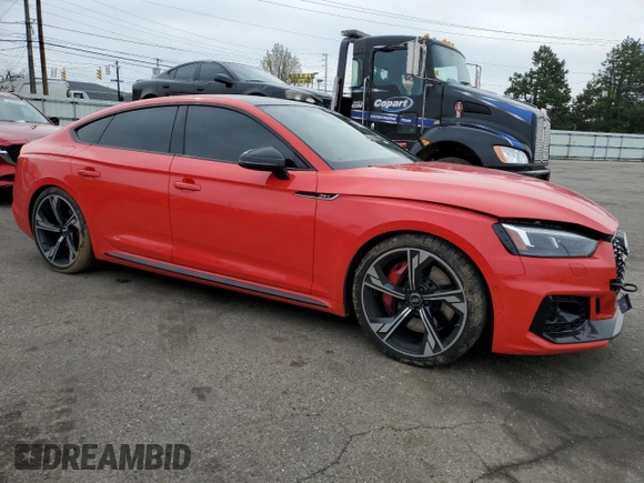 2019 Audi RS 5 Sportback z VIN WUABWCF50KA903230, wystawiony jako Copart lot #53133505 z przebiegiem 55 342 mil mil oraz Szkody całkowita. Historia ofert i sprzedaży dostępna na DreamBid. Obrazek 4.