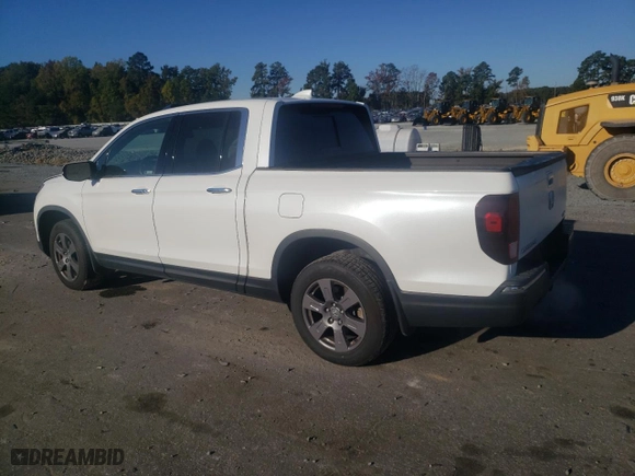 2020 Honda Ridgeline RTL-E with VIN 5FPYK3F77LB002473, listed as a Copart auction lot 77117414 with 62,631 mi miles and Salvage Title. Bid and sale history available at carsss.com. Image 2.