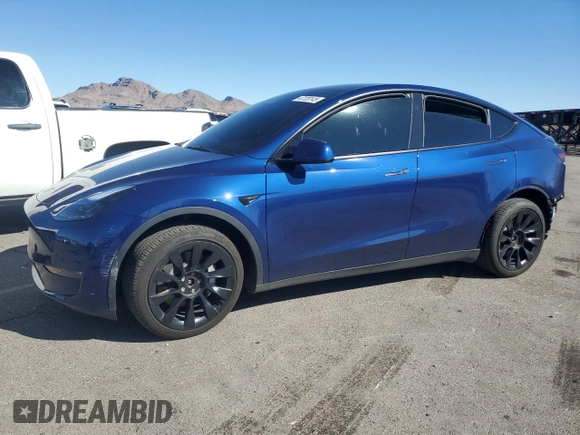 2023 Tesla Model Y Long Range z VIN 7SAYGDEE2PF908622, wystawiony jako Copart lot #47228145 z przebiegiem 10 639 mil mil oraz Szkoda całkowita • Salvage title. Historia ofert i sprzedaży dostępna na DreamBid. Obrazek 1.
