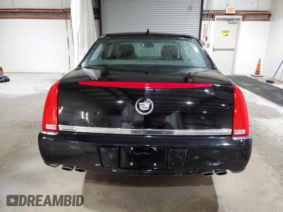 2010 Cadillac DTS 1SC z VIN 1G6KD5EY7AU128077, wystawiony jako Copart lot #58089475 z przebiegiem 203 830 mil mil oraz Szkody całkowita. Historia ofert i sprzedaży dostępna na DreamBid. Obrazek 6.