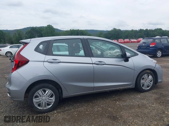 2019 Honda Fit LX z VIN 3HGGK5H45KM725916, wystawiony jako IAAI lot #42654907 z przebiegiem 92 580 mil mil oraz . Historia ofert i sprzedaży dostępna na DreamBid. Obrazek 13.