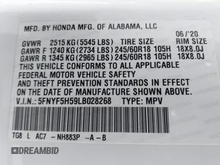 2020 Honda Pilot EX-L with VIN 5FNYF5H59LB028268, listed as a IAAI auction lot 42355620 with 107,033 mi miles and . Bid and sale history available at DreamBid. Image 9.