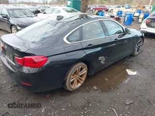 2018 BMW 4 Series 430i xDrive with VIN WBA4J3C56JBG91516, listed as a IAAI auction lot 41824273 with 102,932 mi miles and . Bid and sale history available at DreamBid. Image 6.
