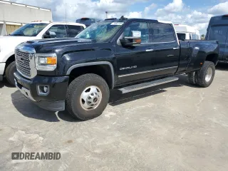 2018 GMC Sierra 3500HD Denali z VIN 1GT42YEY9JF273249, wystawiony jako Copart lot #74801154 z przebiegiem Nie podano mil oraz Nie do naprawy. Historia ofert i sprzedaży dostępna na DreamBid. Obrazek 1.