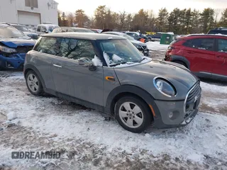 2019 MINI Hardtop Cooper with VIN WMWXP5C52K2H91038, listed as a IAAI auction lot 41509304 with 77,123 mi miles and . Bid and sale history available at DreamBid. Image 1.