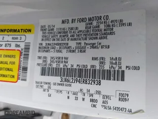 2014 Lincoln MKZ with VIN 3LN6L2J94ER832938, listed as a IAAI auction lot 41919093 with 82,313 mi miles. Bid and sale history available at carsss.com. Image 9.