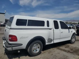 1999 Ford F-150 XL with VIN 1FTZX0726XKA98752, listed as a Copart auction lot 58986695 with Not provided miles and Salvage title. Bid and sale history available at DreamBid. Image 3.