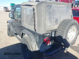 2003 Jeep Wrangler X с VIN 1J4FA39S63P330826, выставлен на аукционе IAAI как лот 41476438 с пробегом 146 517 миль миль и . История ставок и продаж доступна на DreamBid. Изображение 3.