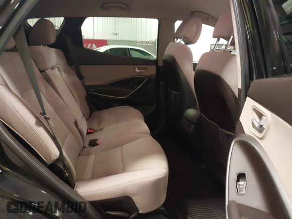 2017 Hyundai Santa Fe 2.4L with VIN 5NMZUDLBXHH041621, listed as a IAAI auction lot 42194586 with 91,012 mi miles and . Bid and sale history available at DreamBid. Image 8.