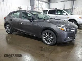 2018 Mazda 3 Touring with VIN 3MZBN1L37JM270277, listed as a Copart auction lot 55070135 with 24,392 mi miles and Salvage Title. Bid and sale history available at DreamBid. Image 4.