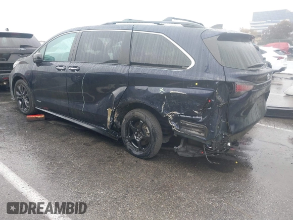 2021 Toyota Sienna XSE with VIN 5TDXRKEC5MS020539, listed as a IAAI auction lot 41569311 with 86,902 mi miles and . Bid and sale history available at DreamBid. Image 3.