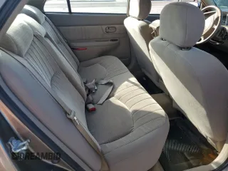 2004 Buick Century Custom with VIN 2G4WS52J641250310, listed as a Copart auction lot 75058634 with Not Provided miles and Salvage Title. Bid and sale history available at carsss.com. Image 10.