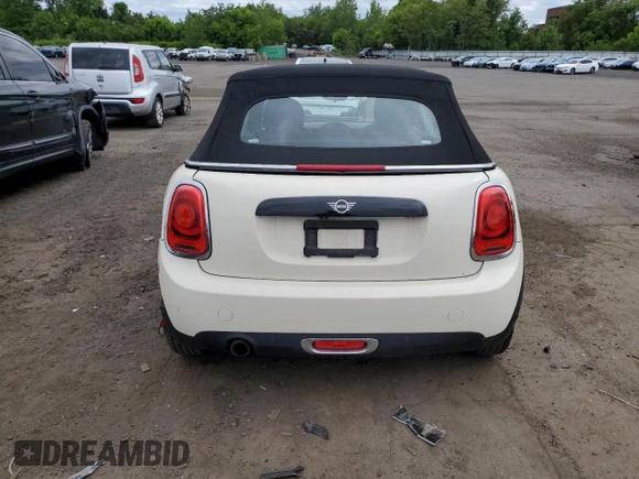 2019 MINI Convertible Cooper с VIN WMWWG5C57K3D01554, выставлен на аукционе Copart как лот 57497795 с пробегом 98 158 миль миль и Списание • Salvage title. История ставок и продаж доступна на DreamBid. Изображение 6.