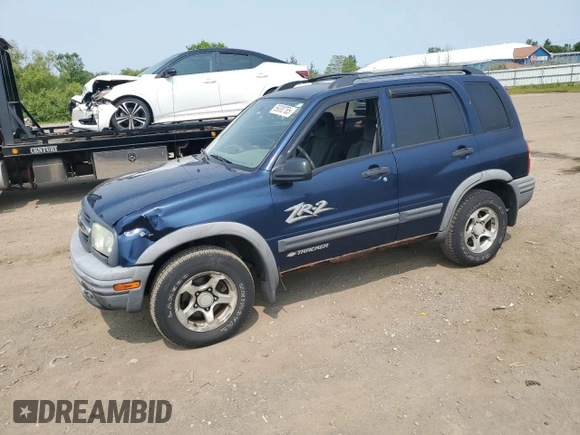 2004 Chevrolet Tracker ZR2 z VIN 2CNBJ734346903751, wystawiony jako Copart lot #59300765 z przebiegiem 126 924 mil mil oraz Szkoda całkowita • Salvage title. Historia ofert i sprzedaży dostępna na DreamBid. Obrazek 1.