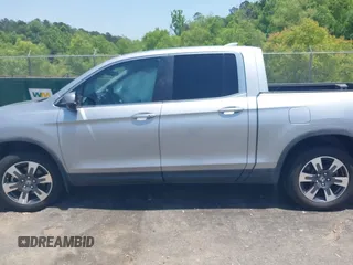2018 Honda Ridgeline RTL z VIN 5FPYK2F5XJB001064, wystawiony jako IAAI lot #42252956 z przebiegiem 95 272 mil mil oraz . Historia ofert i sprzedaży dostępna na DreamBid. Obrazek 15.