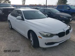 2015 BMW 3 Series 320i with VIN WBA3B1G56FNT64298, listed as a IAAI auction lot 41695116 with 125,926 mi miles. Bid and sale history available at carsss.com. Image 1.
