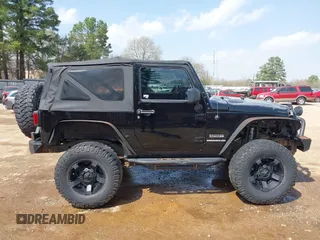 2010 Jeep Wrangler Sport with VIN 1J4AA2D15AL161650, listed as a IAAI auction lot 41805852 with 89,952 mi miles and . Bid and sale history available at carsss.com. Image 13.