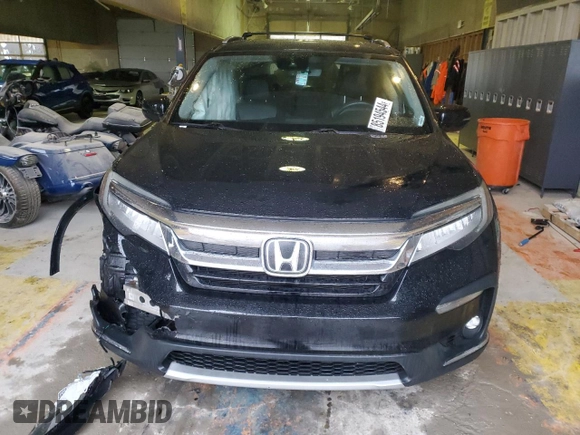 2020 Honda Pilot Touring 8-Passenger with VIN 5FNYF6H90LB043055, listed as a Copart auction lot 85194544 with 82,144 mi miles and Salvage Title. Bid and sale history available at DreamBid. Image 5.