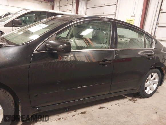 2007 Nissan Altima S with VIN 1N4AL21E77C144161, listed as a IAAI auction lot 42011479 with 175,942 mi miles and . Bid and sale history available at carsss.com. Image 15.