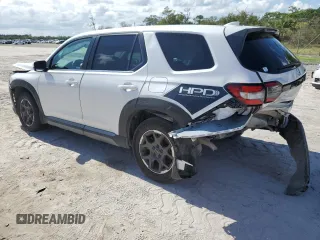 2023 Honda Pilot EX-L 8 Passenger with VIN 5FNYG2H49PB008353, listed as a Copart auction lot 76395124 with 158,867 mi miles and Non Repairable. Bid and sale history available at carsss.com. Image 2.