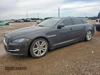 2016 Jaguar XJ Portfolio z VIN SAJWA2G74G8V98077, wystawiony jako Copart lot #60354105 z przebiegiem 84 995 mil mil oraz Czysty tytuł • Clean title. Historia ofert i sprzedaży dostępna na DreamBid. Obrazek 1.