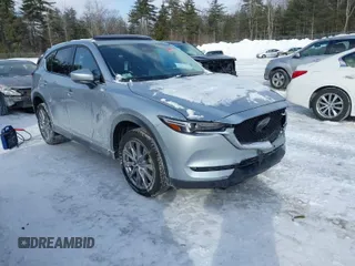 2021 Mazda CX-5 Grand Touring Reserve with VIN JM3KFBAY0M0377030, listed as a IAAI auction lot 41606709 with 39,590 mi miles. Bid and sale history available at carsss.com. Image 1.