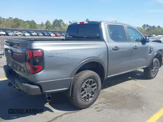 2024 Ford Ranger XLT with VIN 1FTER4GHXRLE46487, listed as a IAAI auction lot 41899384 with 5,570 mi miles. Bid and sale history available at carsss.com. Image 4.