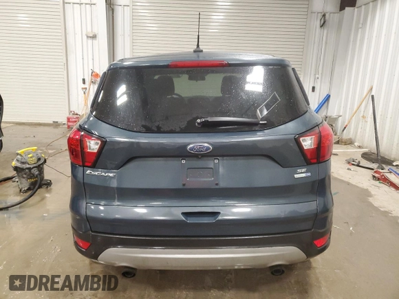 2019 Ford Escape SE z VIN 1FMCU9GD8KUB54347, wystawiony jako Copart lot #87187844 z przebiegiem 86 855 mil mil oraz Szkody całkowita. Historia ofert i sprzedaży dostępna na DreamBid. Obrazek 6.