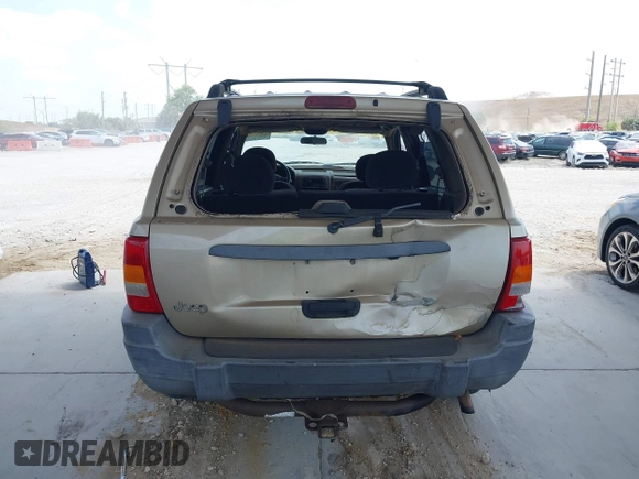 2001 Jeep Grand Cherokee Laredo with VIN 1J4GX48S81C589400, listed as a IAAI auction lot 42091559 with 219,698 mi miles and . Bid and sale history available at DreamBid. Image 6.