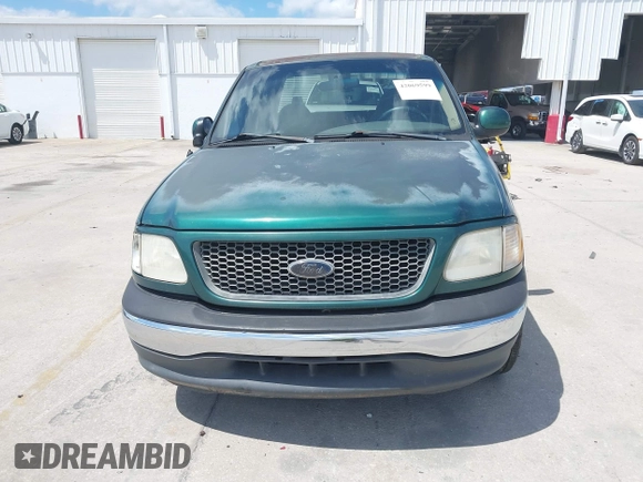 2000 Ford F-150 XL with VIN 1FTZX1729YNB93649, listed as a IAAI auction lot 42069599 with 1 mi miles. Bid and sale history available at carsss.com. Image 12.