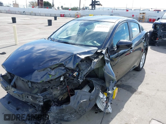 2016 Scion iA z VIN 3MYDLBZVXGY136298, wystawiony jako IAAI lot #42014712 z przebiegiem 124 038 mil mil oraz . Historia ofert i sprzedaży dostępna na DreamBid. Obrazek 6.