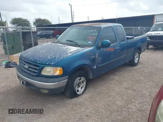 2000 Ford F-150 XL with VIN 1FTZX1722YNB23944, listed as a IAAI auction lot 42618183 with 223,986 mi miles and . Bid and sale history available at DreamBid. Image 2.