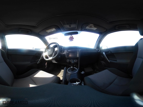2015 Scion tC with VIN JTKJF5C71FJ013747, listed as a IAAI auction lot 42087740 with 138,097 mi miles. Bid and sale history available at carsss.com. Image 18.