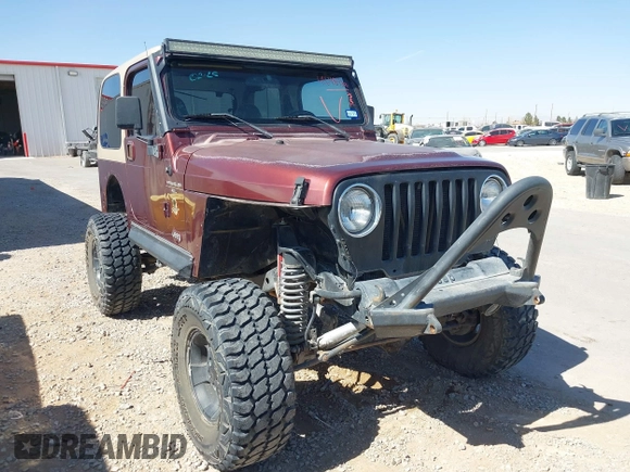 2001 Jeep Wrangler Sahara with VIN 1J4FA59S71P326941, listed as a IAAI auction lot 41648420 with 128,464 mi miles. Bid and sale history available at carsss.com. Image 1.