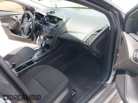 2018 Ford Focus SE with VIN 1FADP3FE2JL227679, listed as a IAAI auction lot 42296608 with 128,269 mi miles and . Bid and sale history available at DreamBid. Image 5.