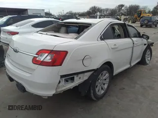 2011 Ford Taurus SE with VIN 1FAHP2DW3BG113398, listed as a IAAI auction lot 41617959 with 123,706 mi miles. Bid and sale history available at carsss.com. Image 4.