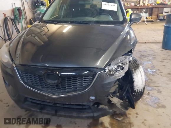2015 Mazda CX-5 Touring with VIN JM3KE2CY2F0458114, listed as a IAAI auction lot 41545493 with 138,061 mi miles. Bid and sale history available at carsss.com. Image 6.