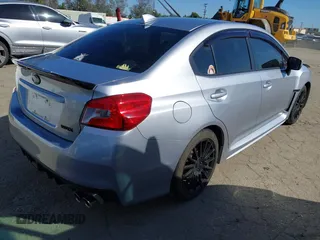 2015 Subaru WRX Premium with VIN JF1VA1D66F9814459, listed as a IAAI auction lot 41831344 with 74,892 mi miles. Bid and sale history available at carsss.com. Image 4.