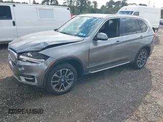 2014 BMW X5 xDrive35i with VIN 5UXKR0C52E0K50710, listed as a IAAI auction lot 40529606 with 114,307 mi miles. Bid and sale history available at carsss.com. Image 2.