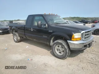 2001 Ford F-350 XL with VIN 1FTSX31F11ED72055, listed as a Copart auction lot 66164624 with 228,597 mi miles and Salvage Title. Bid and sale history available at DreamBid. Image 4.
