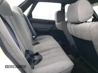 1988 Toyota Camry z VIN JT2SV21E7J3277138, wystawiony jako Copart lot #80039334 z przebiegiem 152 555 mil mil oraz Szkoda całkowita • Salvage title. Historia ofert i sprzedaży dostępna na DreamBid. Obrazek 10.