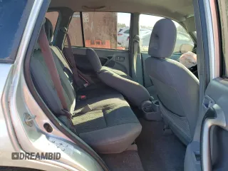 2003 Toyota RAV4 with VIN JTEGH20V130092184, listed as a Copart auction lot 42252955 with 282,299 mi miles and Salvage Title. Bid and sale history available at DreamBid. Image 11.