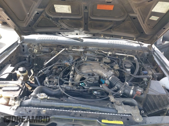 1999 Nissan Frontier XE z VIN 1N6ED26Y5XC321492, wystawiony jako IAAI lot #42116307 z przebiegiem 446 841 mil mil oraz . Historia ofert i sprzedaży dostępna na DreamBid. Obrazek 10.
