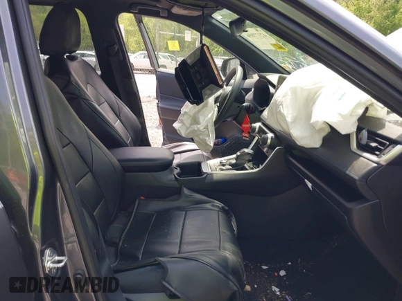 2023 Toyota RAV4 Hybrid SE with VIN JTM16RFV9PD113152, listed as a IAAI auction lot 42177056 with 41,204 mi miles and . Bid and sale history available at DreamBid. Image 5.