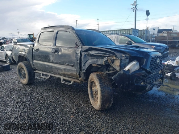 2020 Toyota Tacoma SR5 z VIN 5TFCZ5AN9LX216032, wystawiony jako IAAI lot #41448197 z przebiegiem 128 581 mil mil oraz . Historia ofert i sprzedaży dostępna na DreamBid. Obrazek 1.